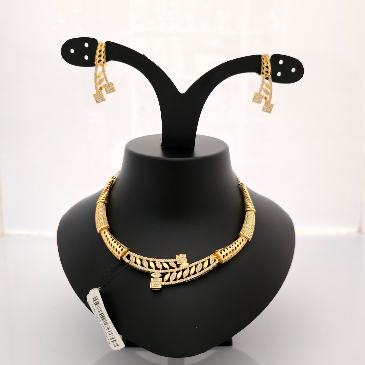 1.5 gram gold forming gold tone white stone AD zirconia leaf pattern designer necklace set with earrings for women stylish jewellery