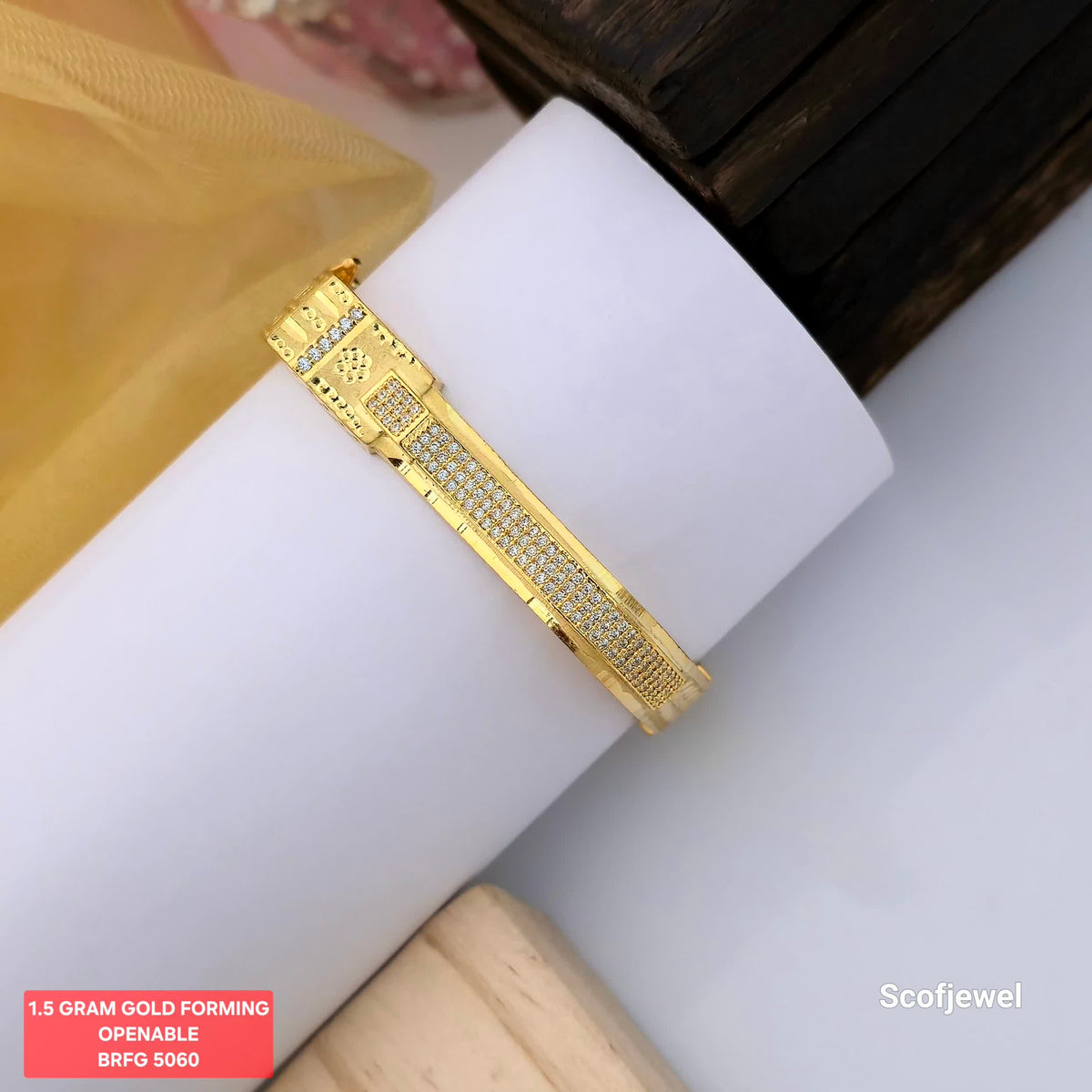1.5 gram gold forming openable designer bangle, gold tone bangle with white stone detailing, geometric pattern stone studded bangle, elegant openable gold bangle for women, traditional gold finish bangle, designer forming jewellery for festive wear, Scofjewel BRFG 5060 bangle