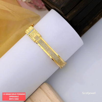 1.5 gram gold forming openable designer bangle, gold tone bangle with white stone detailing, geometric pattern stone studded bangle, elegant openable gold bangle for women, traditional gold finish bangle, designer forming jewellery for festive wear, Scofjewel BRFG 5060 bangle