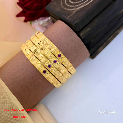 1.5 gram gold forming bangles set of four, gold tone traditional bangles with purple round stones, designer purple stone bangles for women, intricate floral pattern gold forming bangles, traditional Indian bangles for wedding and festive wear, gold forming jewellery set, Scofjewel BGFG 5128 bangles