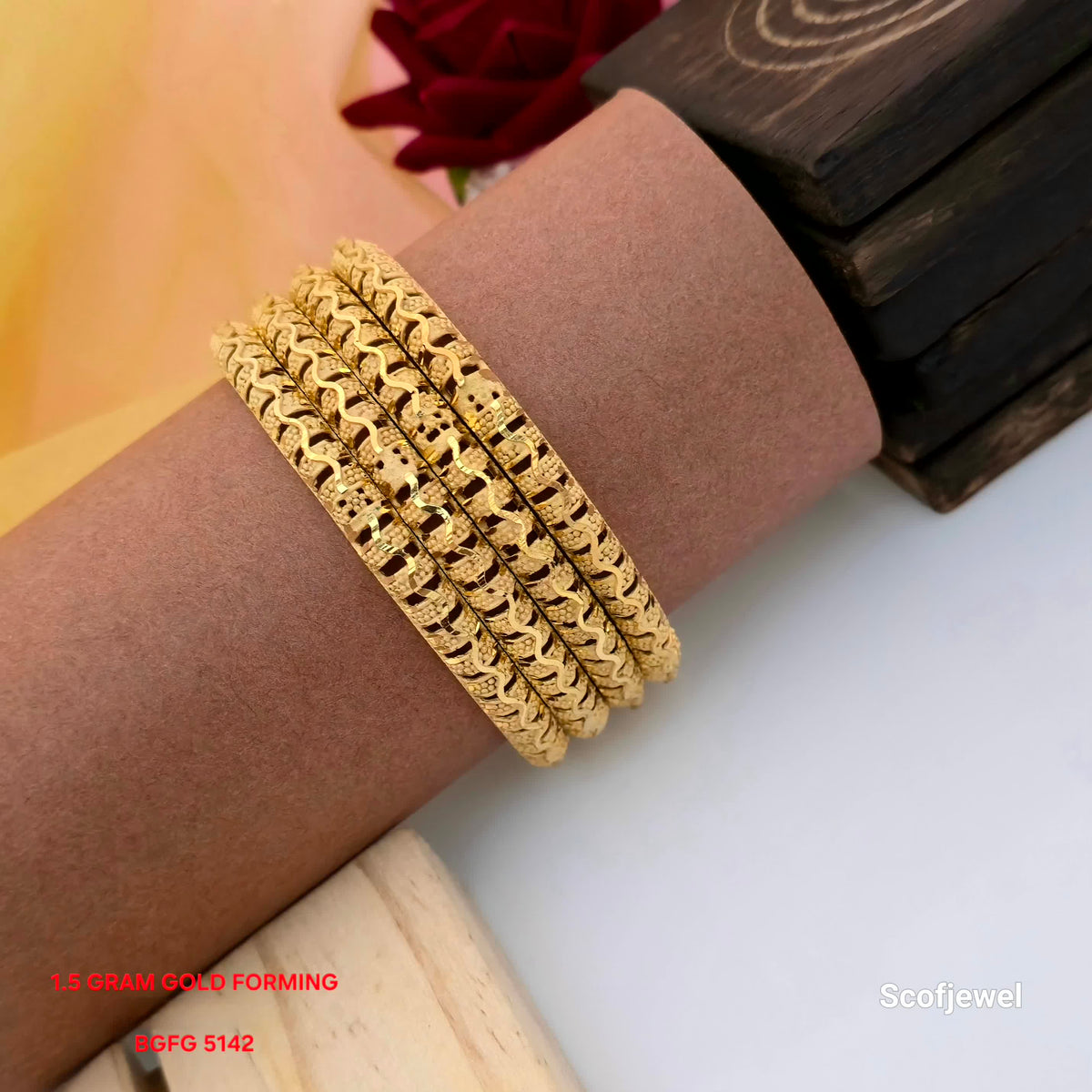 1.5 gram gold forming designer bangles set of 4, gold tone bangles with wavy pattern detailing, traditional textured bangles for women, intricate gold forming bangles, stylish ethnic bangles for weddings and festivals, decorative designer bangles set, Scofjewel BGFG 5142