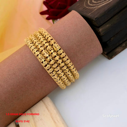 1.5 gram gold forming designer bangles set of 4, gold tone bangles with wavy pattern detailing, traditional textured bangles for women, intricate gold forming bangles, stylish ethnic bangles for weddings and festivals, decorative designer bangles set, Scofjewel BGFG 5142