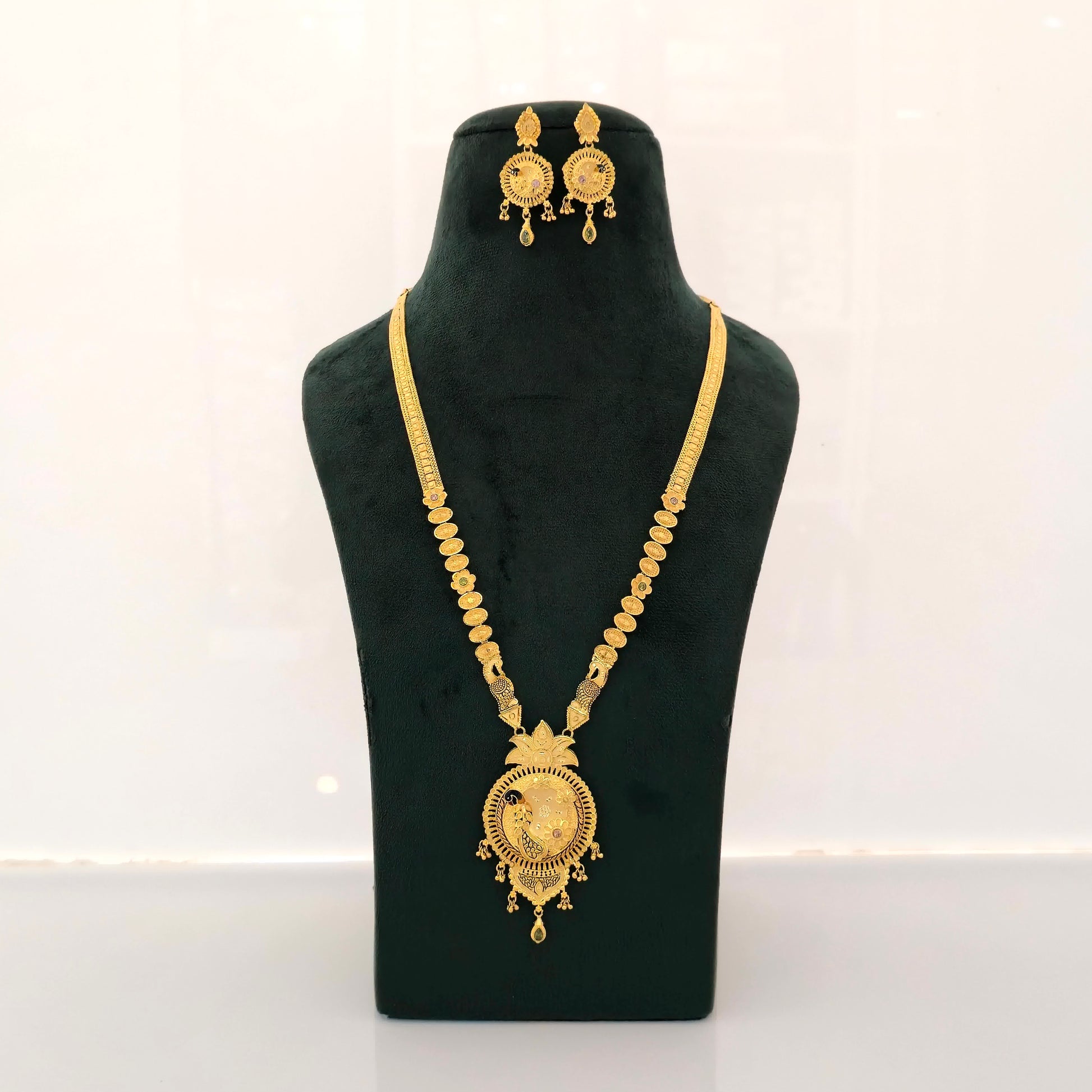 1 gram gold forming long temple haram necklace with coin design peacock pendant and matching earrings for women