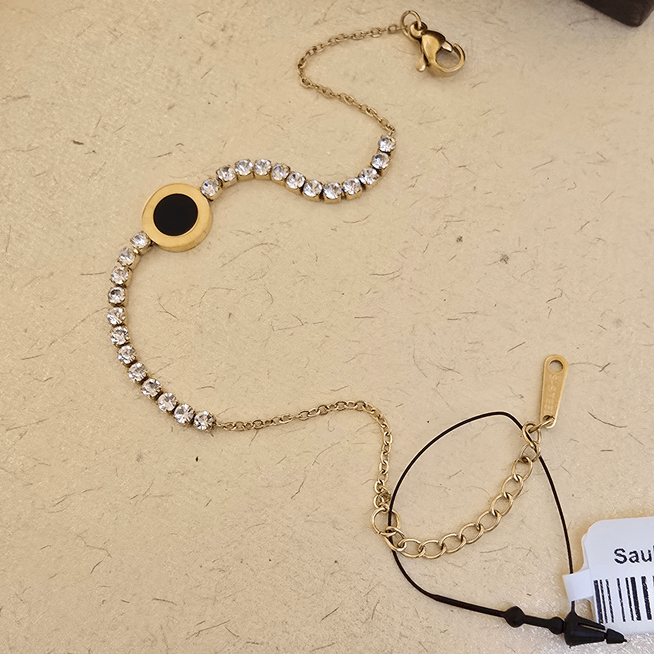 Gold Crystal Charm Bracelet with Black Accent