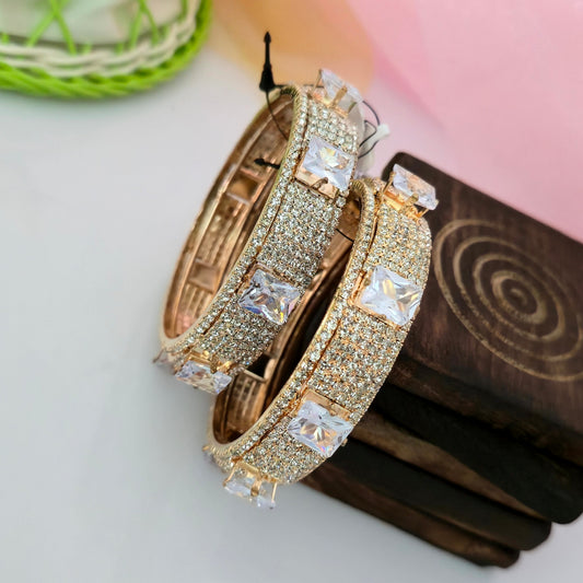 AD princess cut statement bangles, american diamond square stone bangles, gold finish designer bangles for women, sparkling CZ statement bangles, bridal wedding party wear artificial jewellery
