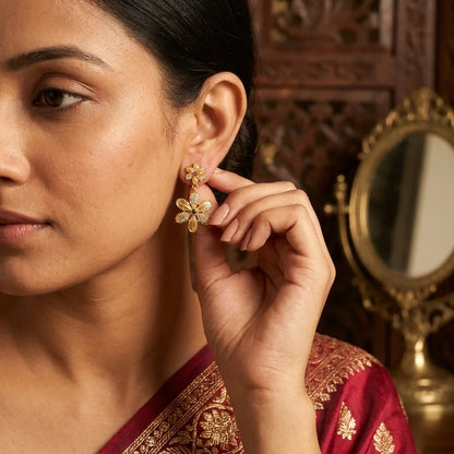 AD zirconia floral earrings, gold flower earrings, designer drop earrings, party wear earrings, ethnic floral earrings, water resistant earrings, zirconia dangler earrings