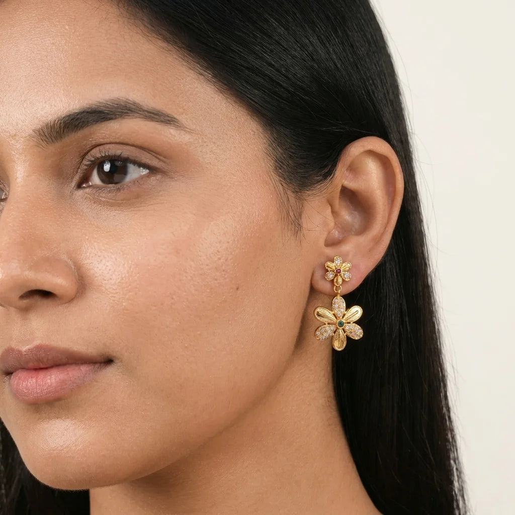 AD zirconia floral earrings, gold flower earrings, designer drop earrings, party wear earrings, ethnic floral earrings, water resistant earrings, zirconia dangler earrings