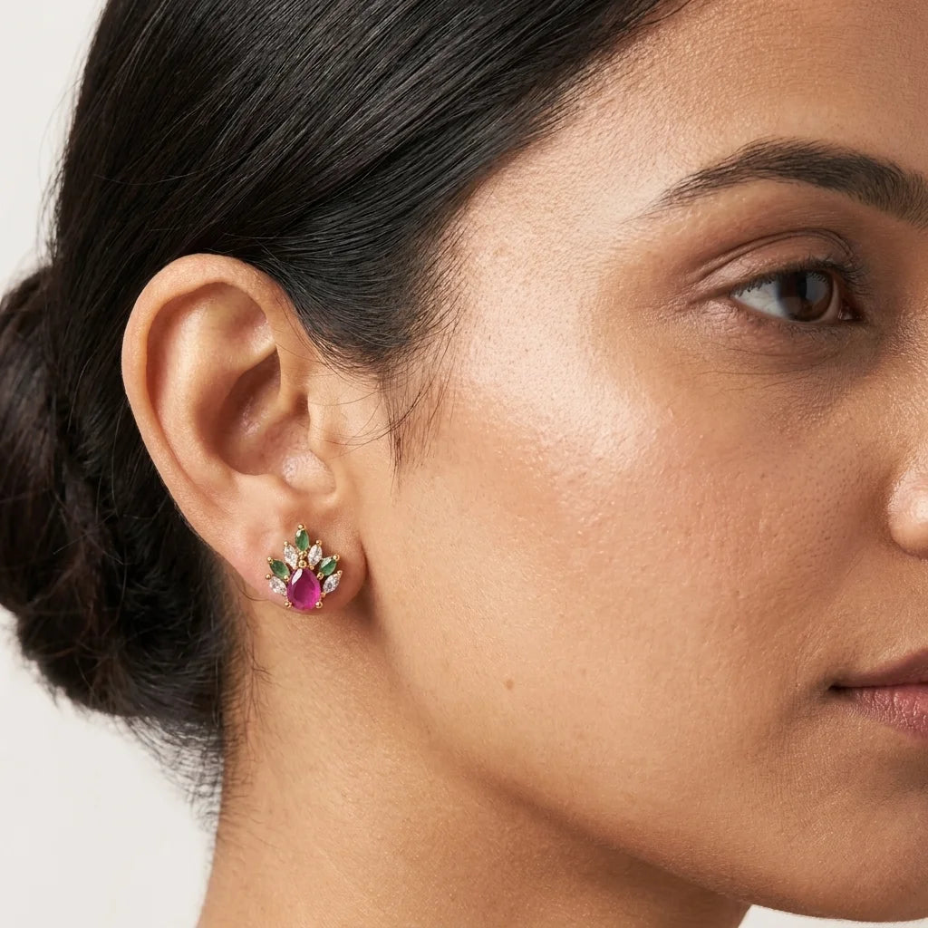 AD zirconia floral stud earrings, traditional gold earrings, ruby green stone earrings, ethnic designer earrings, festive womens earrings, lightweight zirconia earrings, water resistant earrings