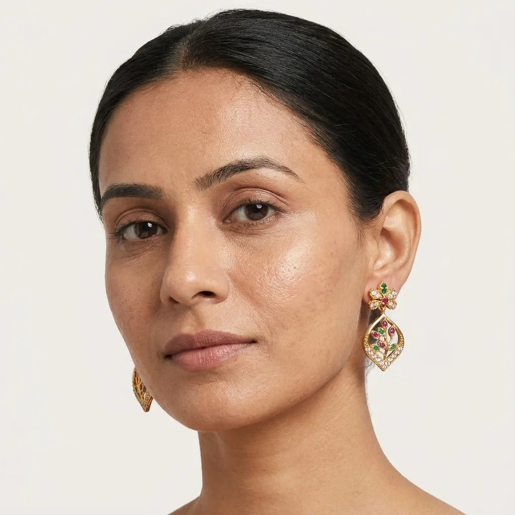 AD zirconia leaf earrings, floral drop earrings, ethnic designer earrings, gold finish earrings, festive earrings for women, water resistant earrings, traditional zirconia earrings