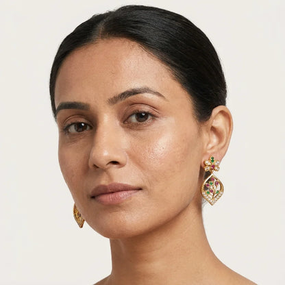 AD zirconia leaf earrings, floral drop earrings, ethnic designer earrings, gold finish earrings, festive earrings for women, water resistant earrings, traditional zirconia earrings