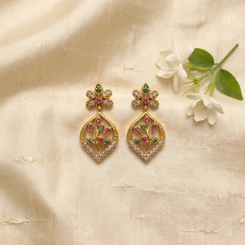 AD zirconia leaf earrings, floral drop earrings, ethnic designer earrings, gold finish earrings, festive earrings for women, water resistant earrings, traditional zirconia earrings