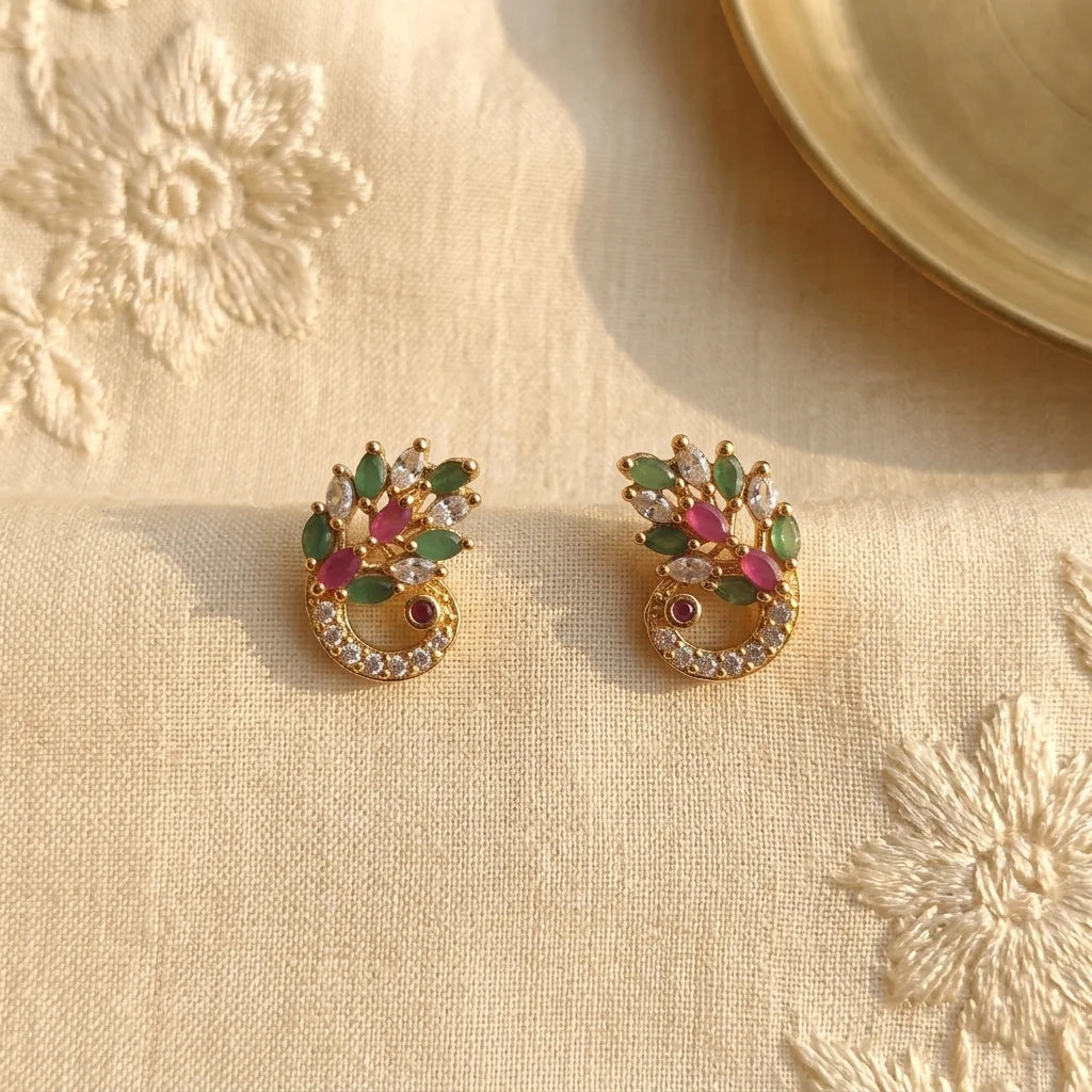 AD zirconia peacock earrings, traditional stud earrings, gold ethnic earrings, ruby green stone earrings, festive womens earrings, designer zirconia earrings, water resistant earrings