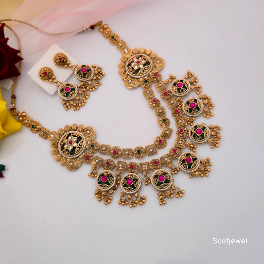 antique gold pink and green kundan bridal necklace set, traditional gold tone necklace with matching earrings, pink and green stone artificial jewellery set for women, antique finish imitation bridal necklace, traditional Indian wedding necklace set, kundan style ethnic necklace with golden bead drops, statement necklace set for festive wear, Scofjewel traditional jewellery