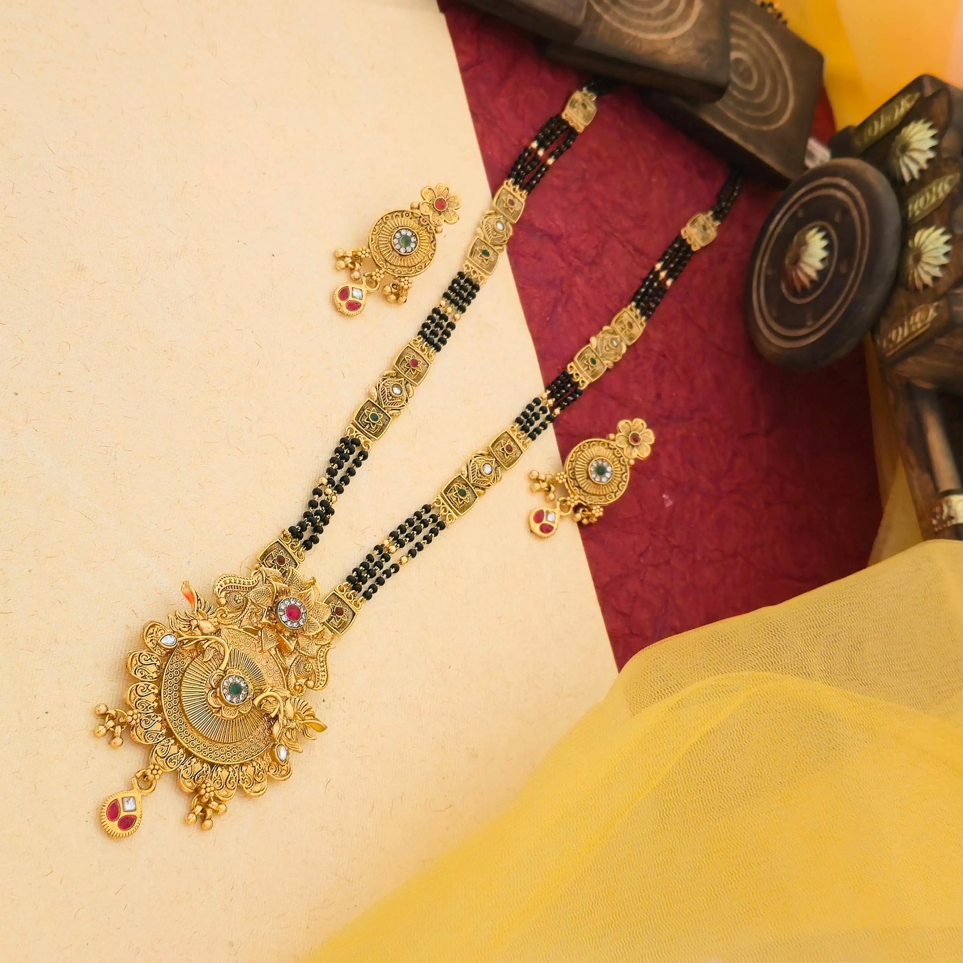 peacock temple mangalsutra, antique gold mangalsutra set, designer black bead mangalsutra, multicolor stone mangalsutra, traditional indian mangalsutra, imitation jewellery mangalsutra
