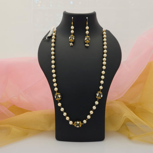 cream pearl beads long necklace mala with matching earrings, cream pearl style necklace with gold tone decorative beads, long pearl necklace set for women, traditional cream and gold artificial jewellery, pearl beads necklace with white stone style accents, elegant imitation jewellery necklace mala, gold tone long necklace with matching earrings