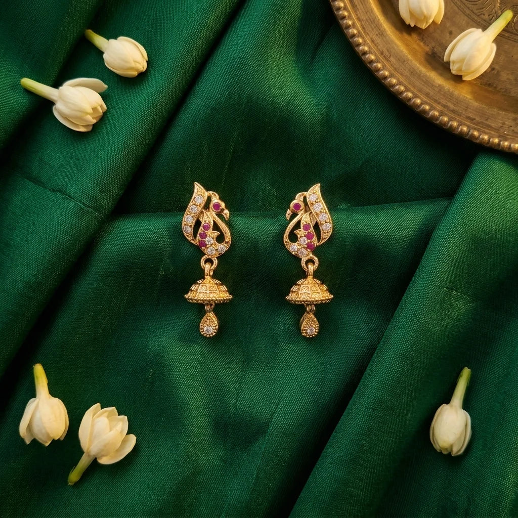 designer peacock earrings, mini jhumka earrings, AD stone earrings, screw back earrings, traditional gold earrings, festive ethnic jewellery, imitation jewellery for women