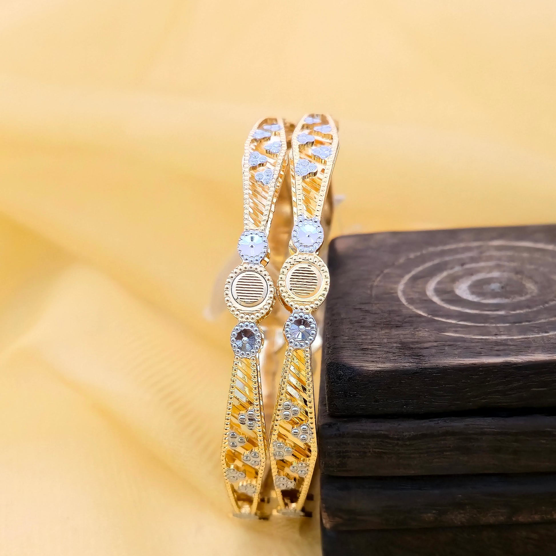 floral bangles, cnc bangles, dual tone bangles, traditional bangles, gold silver bangles, designer bangles