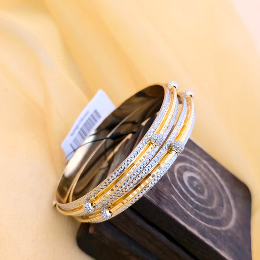 dual tone bangles, cnc bangles, linear bangles, modern bangles, gold silver bangles, designer bangles