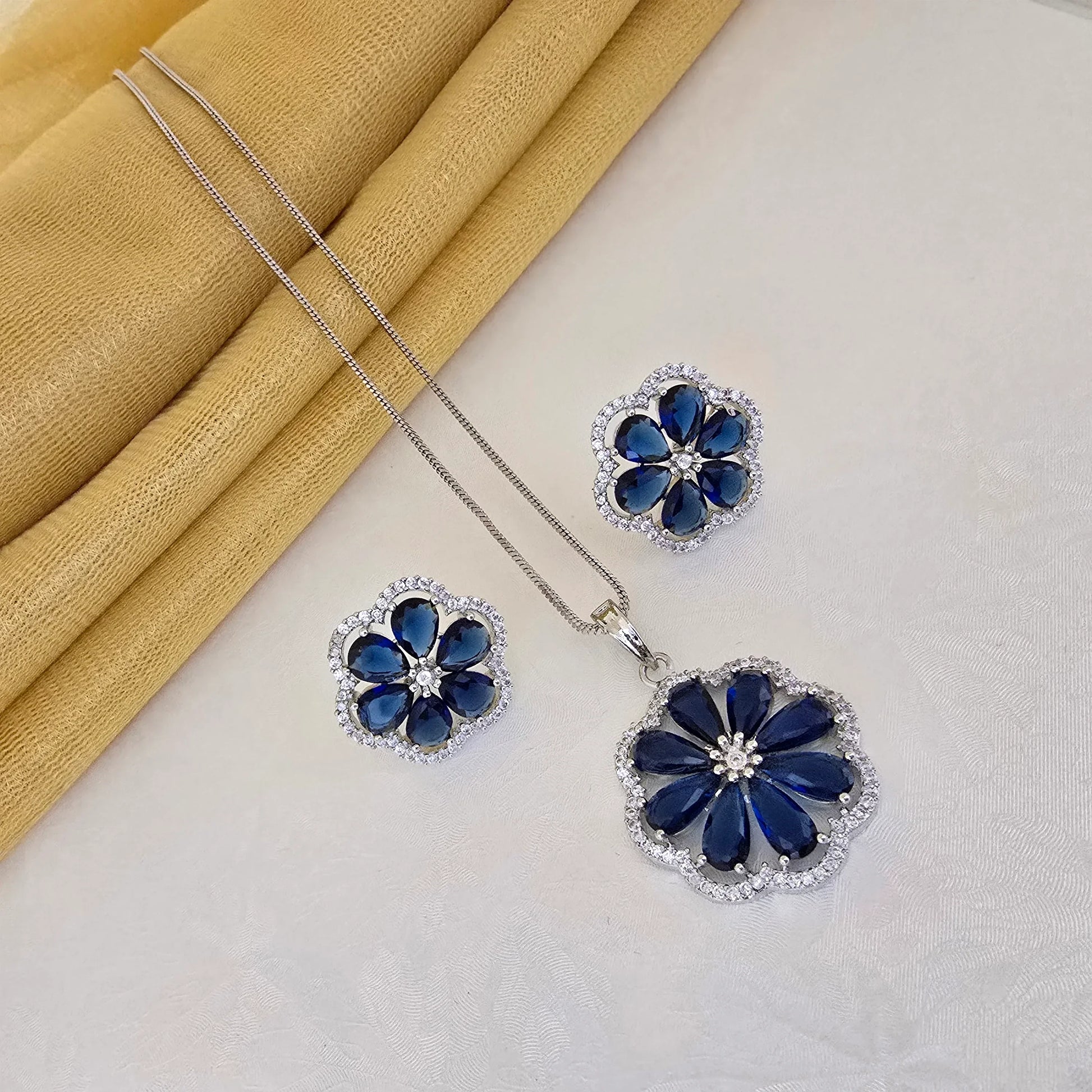 Floral_Stone_Pendant_Set_with_Earrings_navy_blue_Color_Variants_Jewellery - Saubhagya Collection 