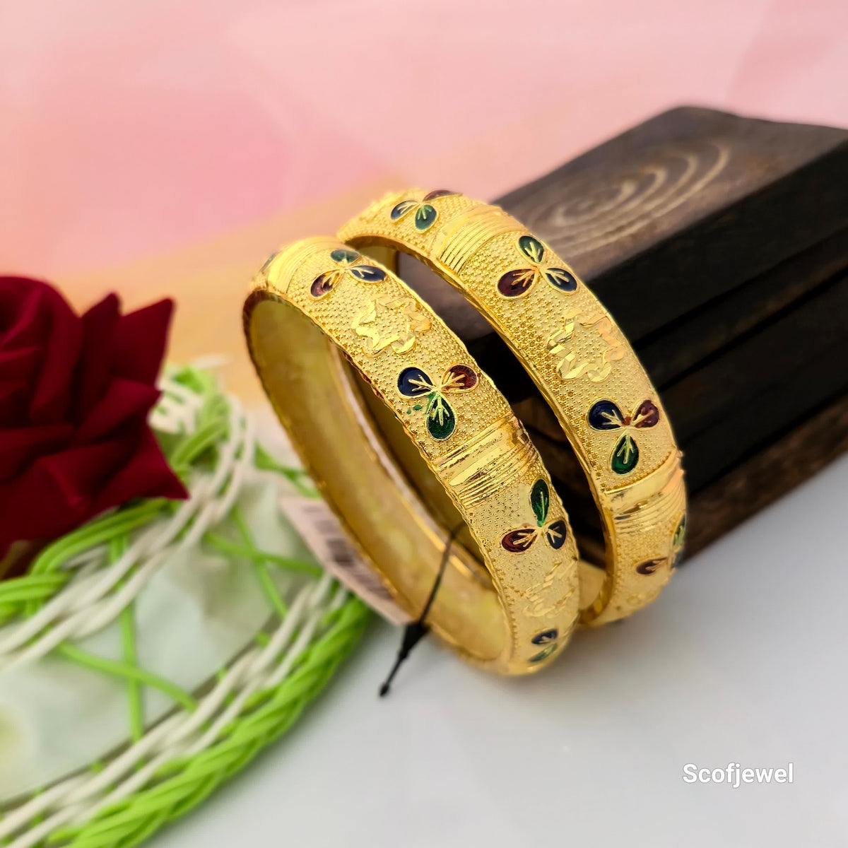 gold tone traditional designer bangles for women, multicolour floral enamel style bangles, gold finish bangles with green navy blue and maroon motifs, textured traditional Indian bangles, ethnic imitation jewellery for women, decorative gold tone bangles for festive wear, designer bangles for saree and lehenga, Scofjewel gold tone bangles