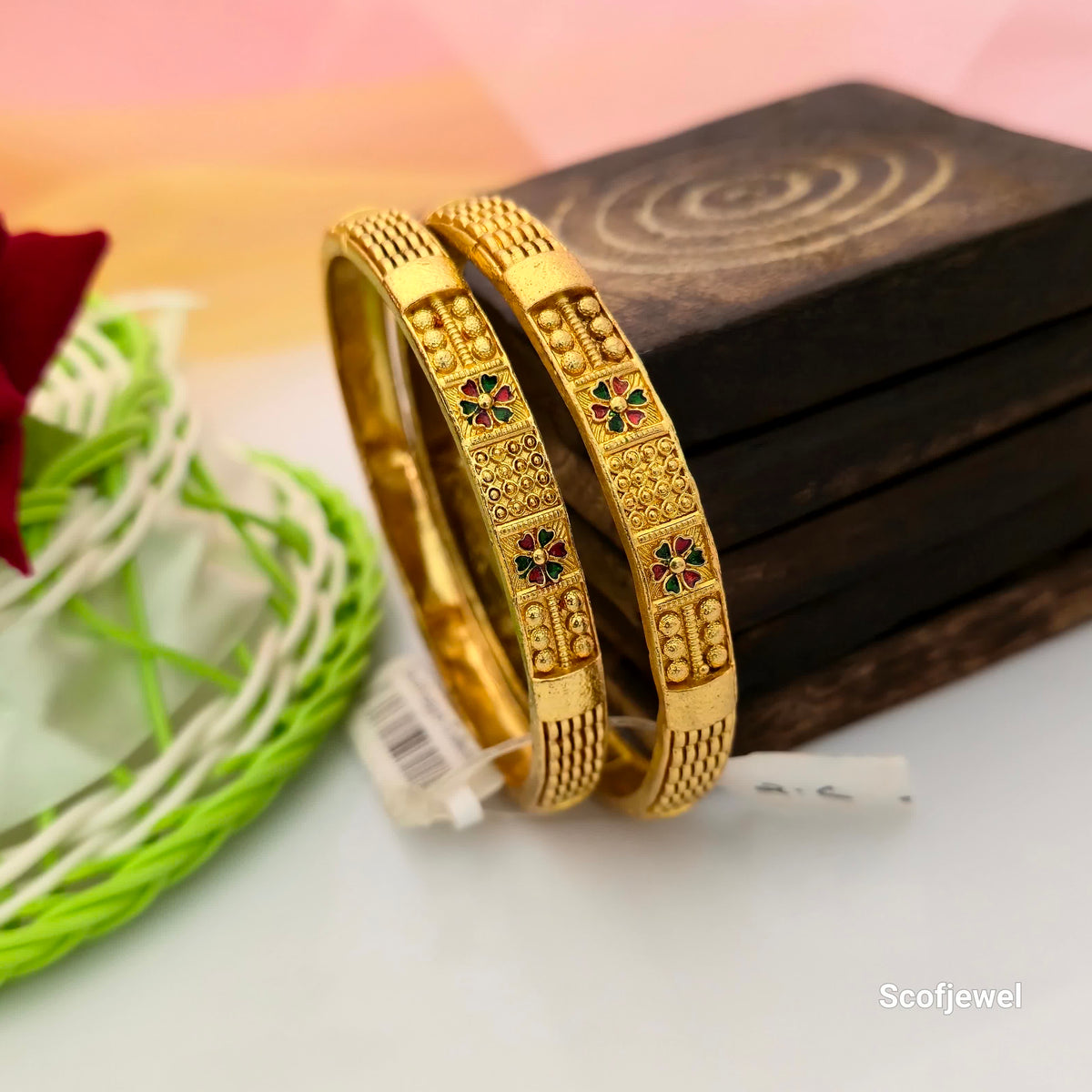 gold tone traditional designer bangles for women, gold colour bangles with red and green floral enamel, engraved Indian ethnic bangles, decorative floral pattern bangles, traditional bangles for festive wear, designer gold tone bangles for saree and lehenga, Scofjewel traditional bangles