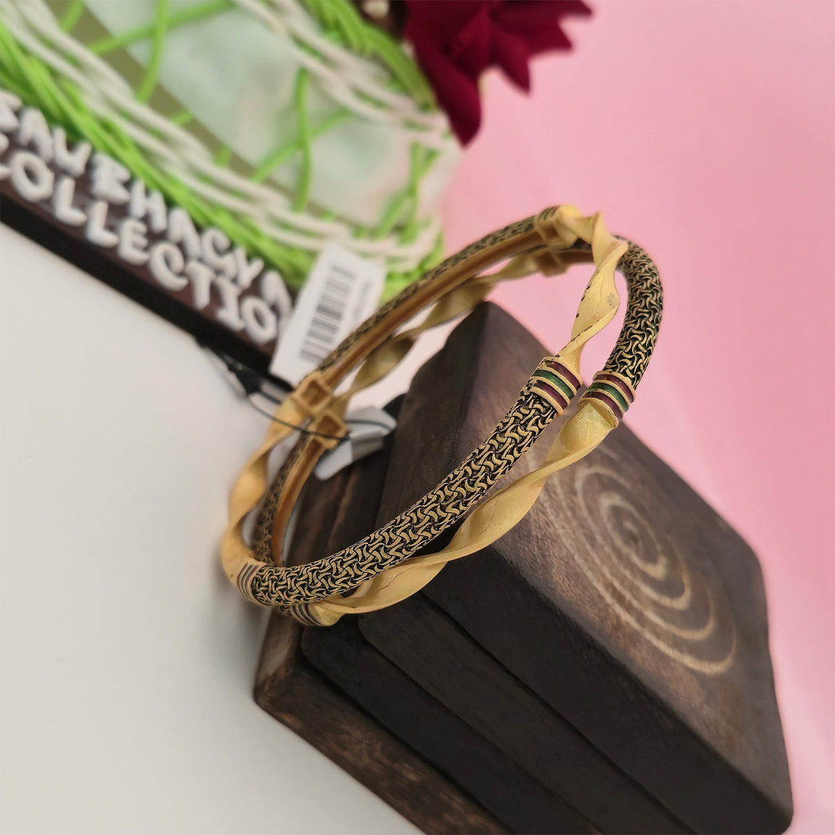 gold tone twisted designer bangles with antique black pattern, traditional gold and black imitation bangles for women, curved gold tone bangles with maroon and green accents, antique style designer bangles for ethnic wear, traditional Indian fashion jewellery, gold tone festive bangles for women, Scofjewel designer bangles