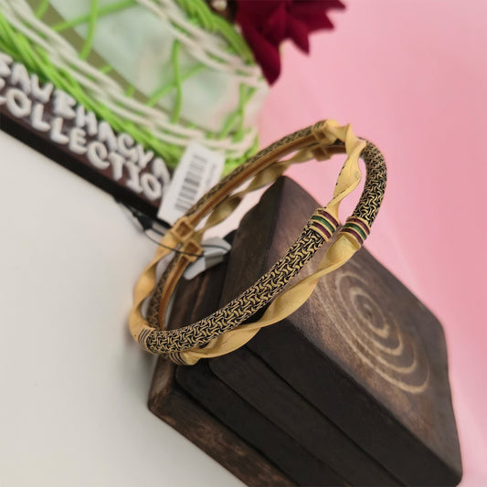 gold tone twisted designer bangles with antique black pattern, traditional gold and black imitation bangles for women, curved gold tone bangles with maroon and green accents, antique style designer bangles for ethnic wear, traditional Indian fashion jewellery, gold tone festive bangles for women, Scofjewel designer bangles