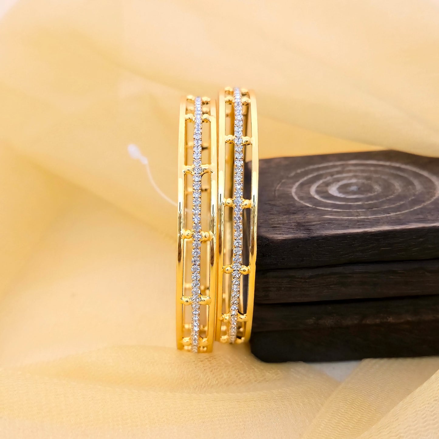 double line ad bangles, american diamond bangles, gold plated bangles, stone bangles, modern bangles, designer bangles