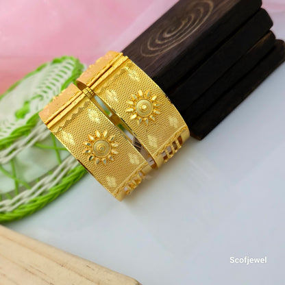 gold plated openable bangles for women, broad golden bangles with sunburst engraving, traditional gold tone bangles with dotted texture, designer engraved bangles for ethnic wear, gold finish bangles with decorative borders, traditional openable bangles for weddings and festivals, Scofjewel gold bangles