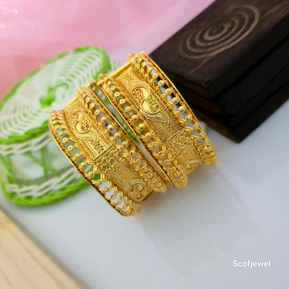 gold plated openable bangles for women, traditional golden bangles with paisley engraving, broad gold tone bangles with intricate openwork design, designer paisley bangles for ethnic wear, engraved gold plated bangles for weddings, traditional openable bangles for festive occasions, Scofjewel gold bangles