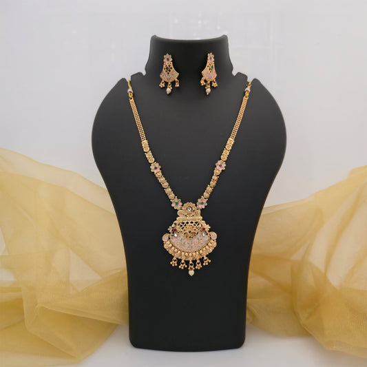 gold plated Rajwadi polish necklace set with ornate pink floral pendant, intricate gold tone traditional motifs, pink green red and white stone accents, pearl style hanging drop, matching drop earrings, traditional artificial jewellery for women, wedding and festive necklace set