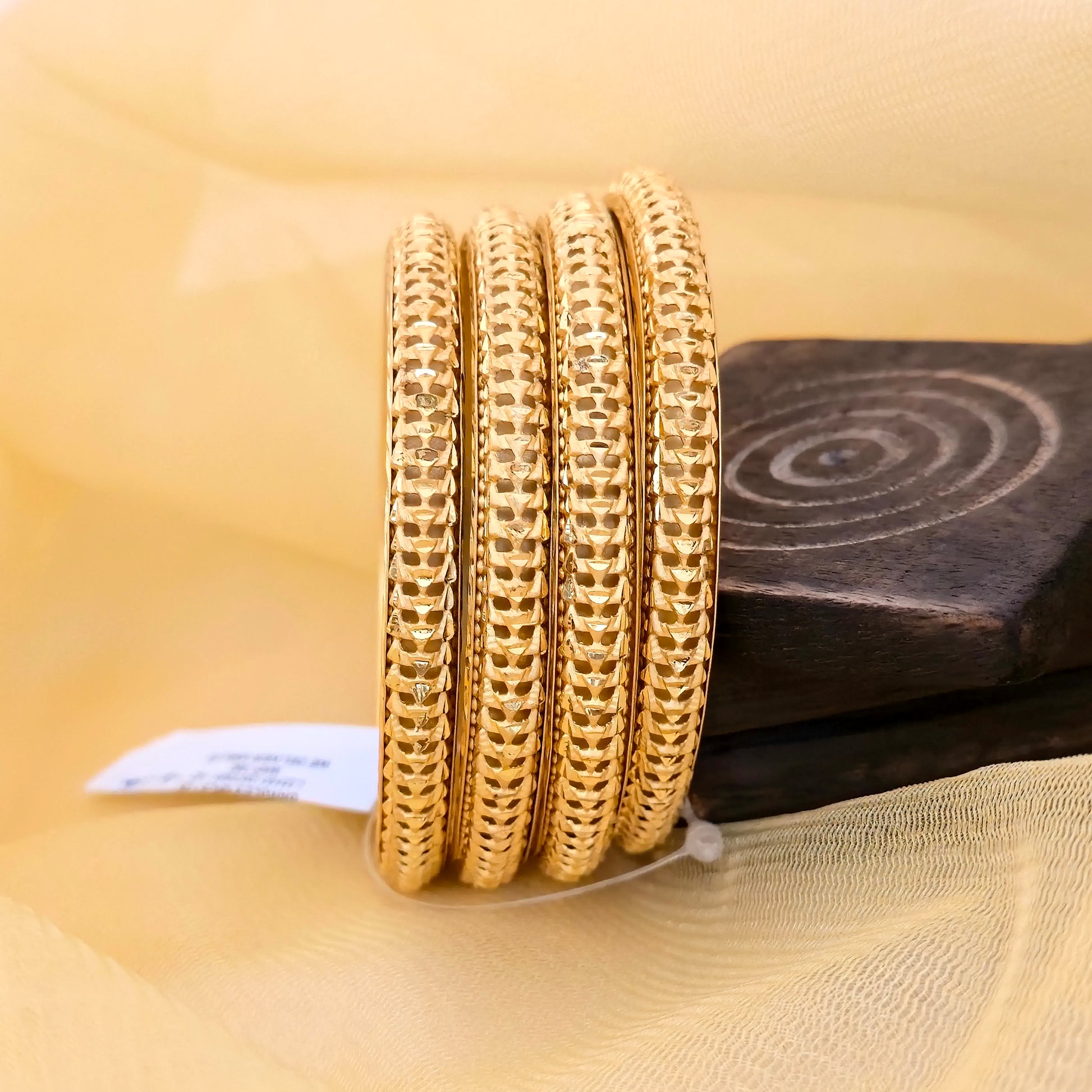textured bangles, woven pattern bangles, gold bangles set, daily wear bangles, elegant bangles, party wear bangles