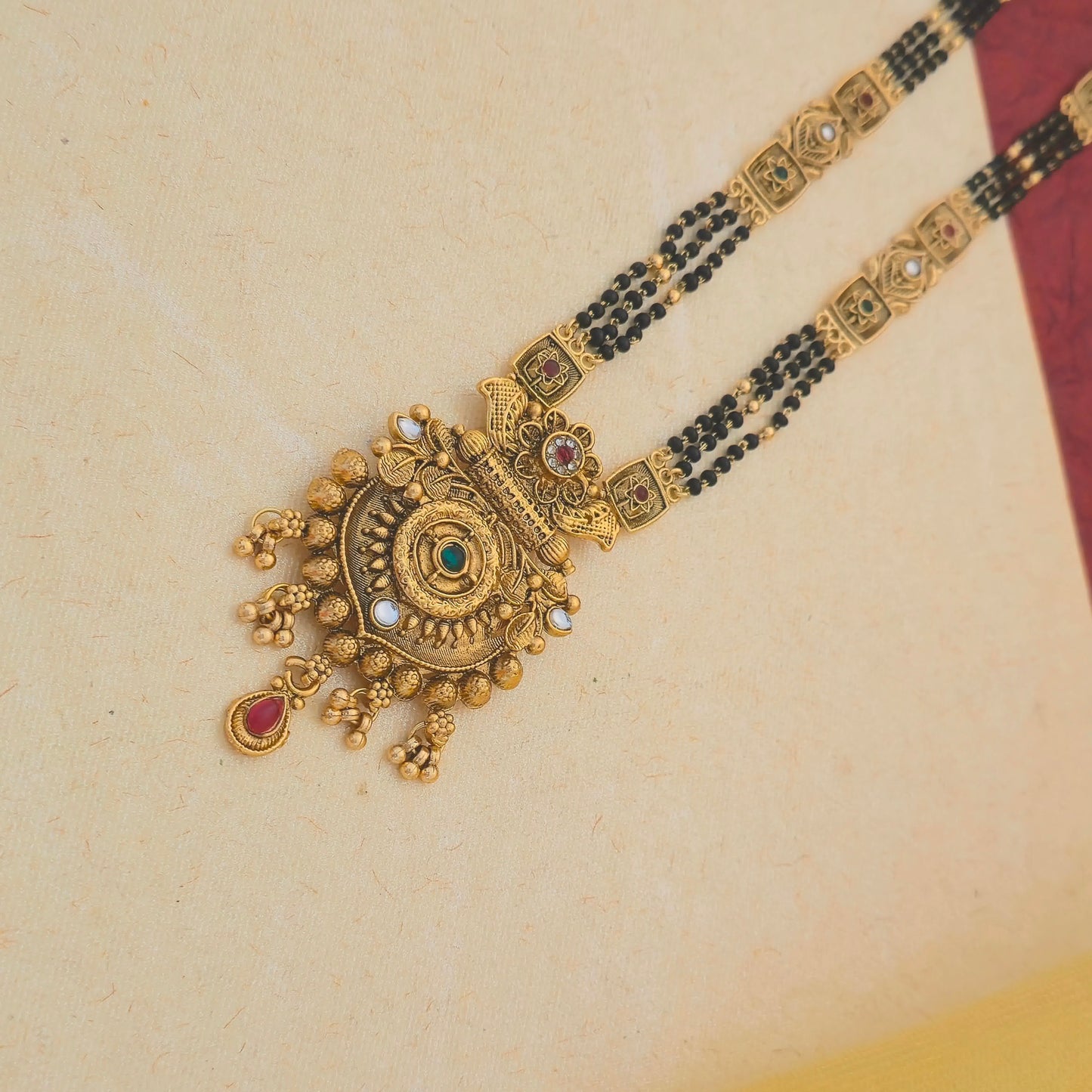 Designer Gold Plated Mangalsutra Set with Antique Floral Pendant & Multicolor Stone Detailing | Black Bead Traditional Jewellery