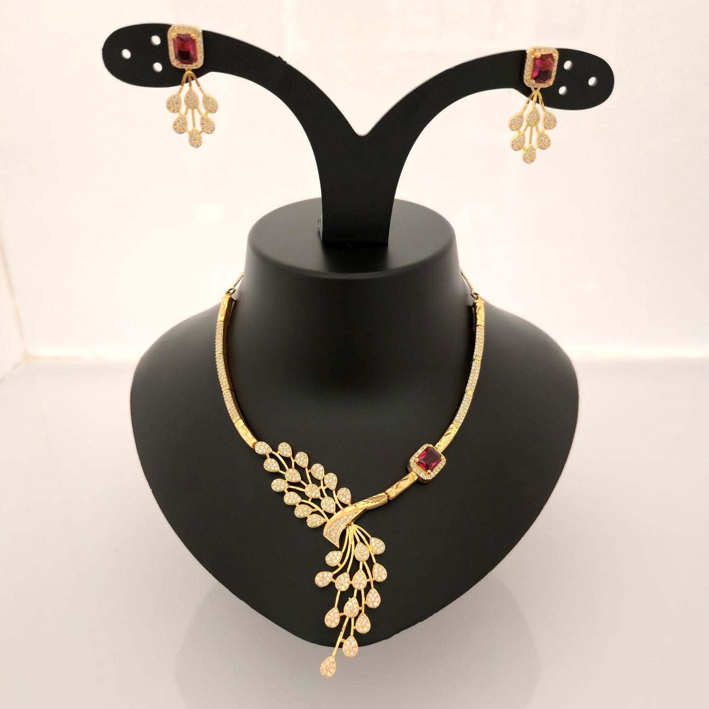 1.5 Gram Gold (Forming) Gold Tone Red Stone AD/Zirconia Necklace Set | Elegant Designer Leaf Style Necklace with Earrings for Women