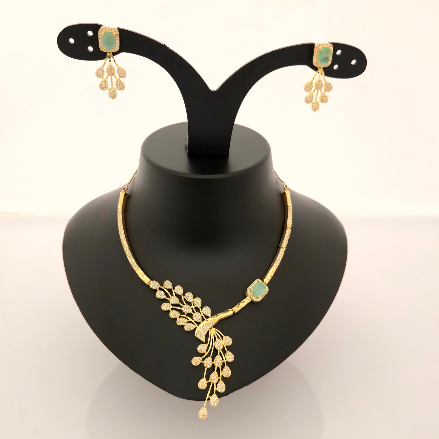 1.5 Gram Gold (Forming) Gold Tone Red Stone AD/Zirconia Necklace Set | Elegant Designer Leaf Style Necklace with Earrings for Women