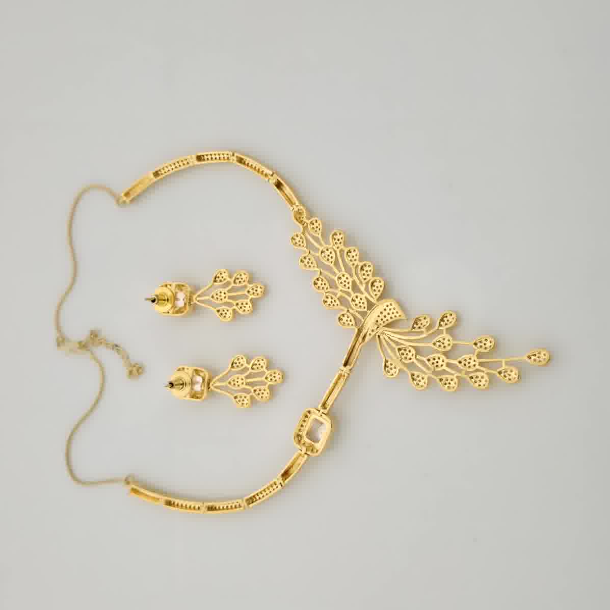 1.5 Gram Gold (Forming) Gold Tone Red Stone AD/Zirconia Necklace Set | Elegant Designer Leaf Style Necklace with Earrings for Women