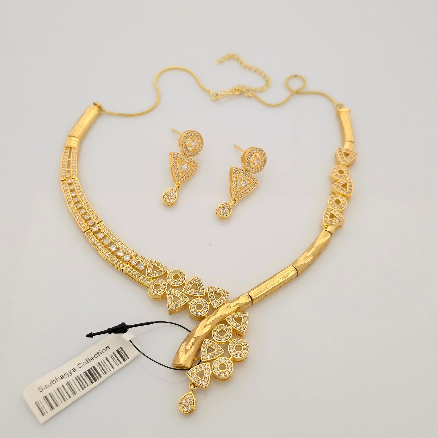 1.5 Gram Gold (Forming) Gold Tone White Stone AD/Zirconia Designer Necklace Set | Stylish Asymmetrical Necklace with Earrings for Women