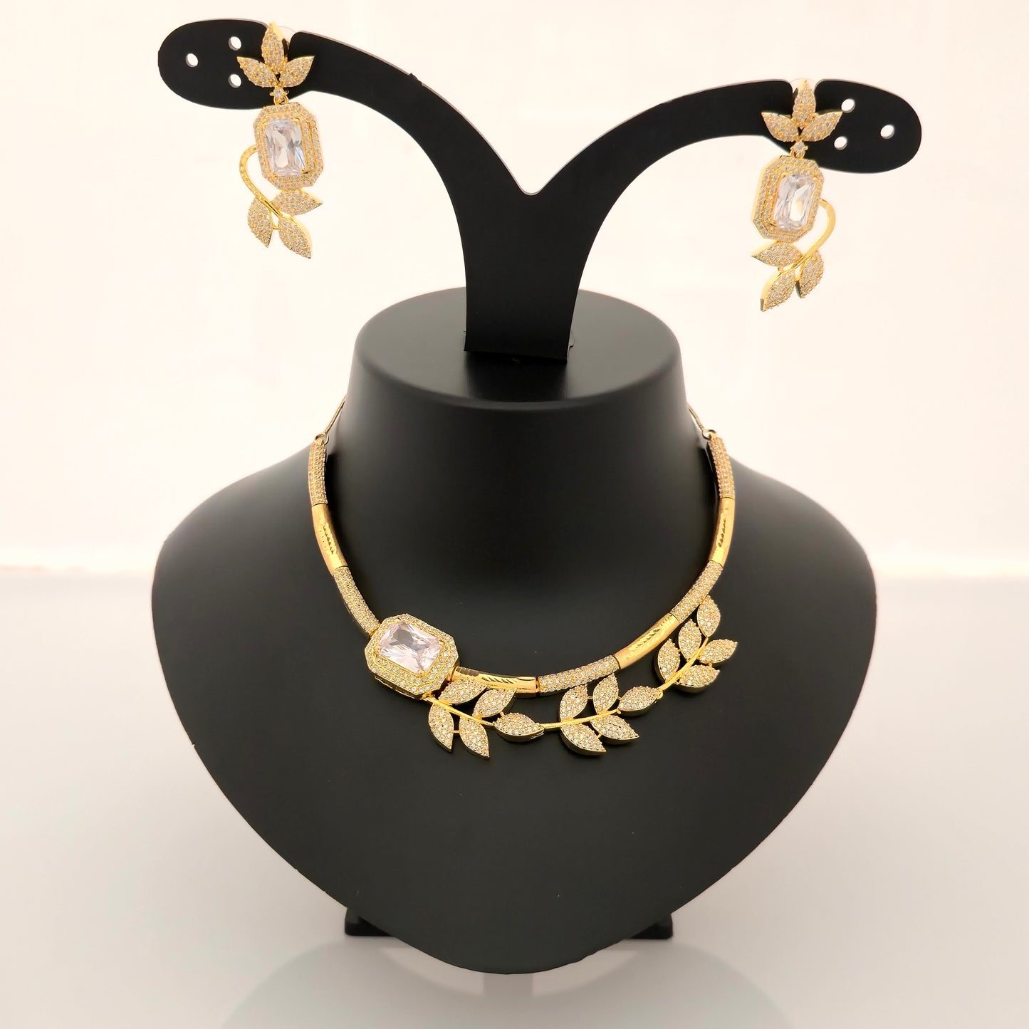 1.5 Gram Gold (Forming) Gold Tone Pink Stone AD/Zirconia Leaf Design Necklace Set | Elegant Designer Necklace with Earrings for Women