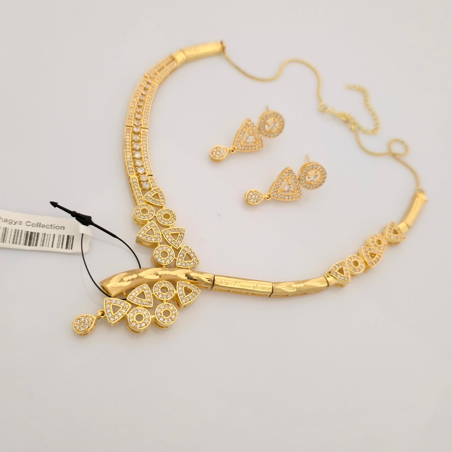 1.5 Gram Gold (Forming) Gold Tone White Stone AD/Zirconia Designer Necklace Set | Stylish Asymmetrical Necklace with Earrings for Women