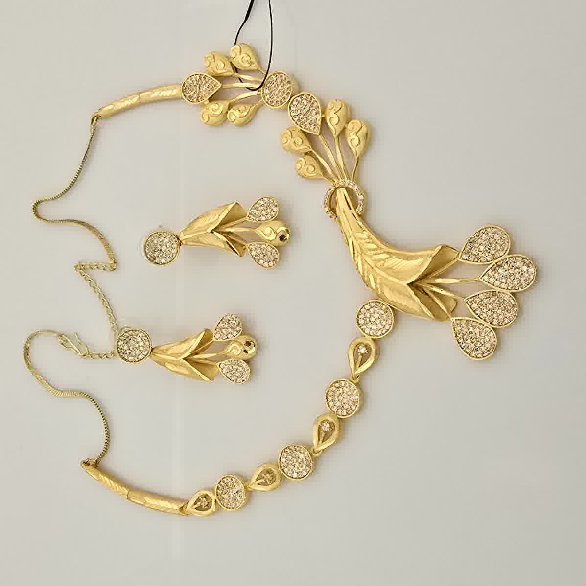 1.5 Gram Gold (Forming) Gold Tone White Stone AD/Zirconia Leaf Drop Necklace Set | Designer Floral Pendant Necklace with Earrings & Mangalsutra for Women