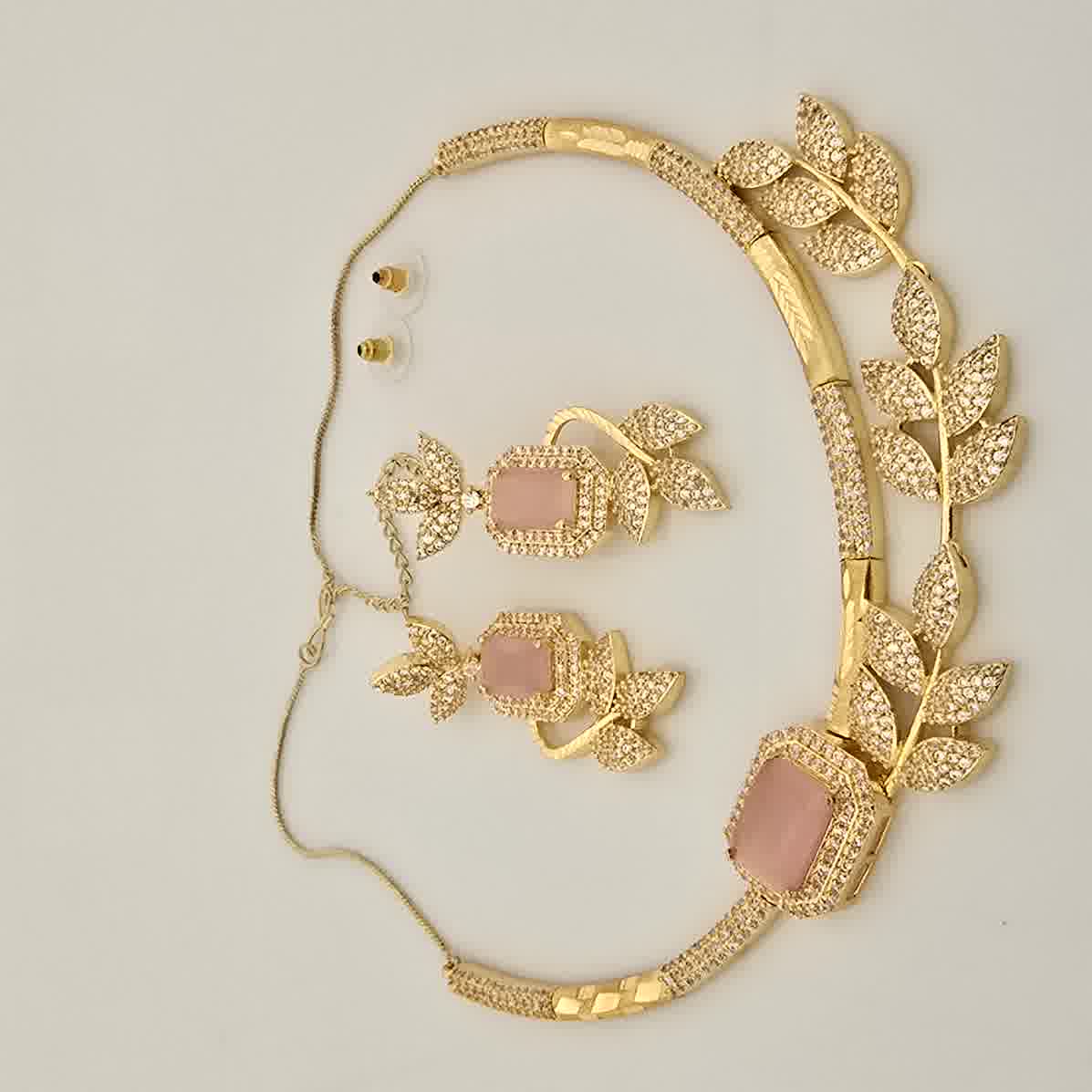 1.5 Gram Gold (Forming) Gold Tone Pink Stone AD/Zirconia Leaf Design Necklace Set | Elegant Designer Necklace with Earrings for Women
