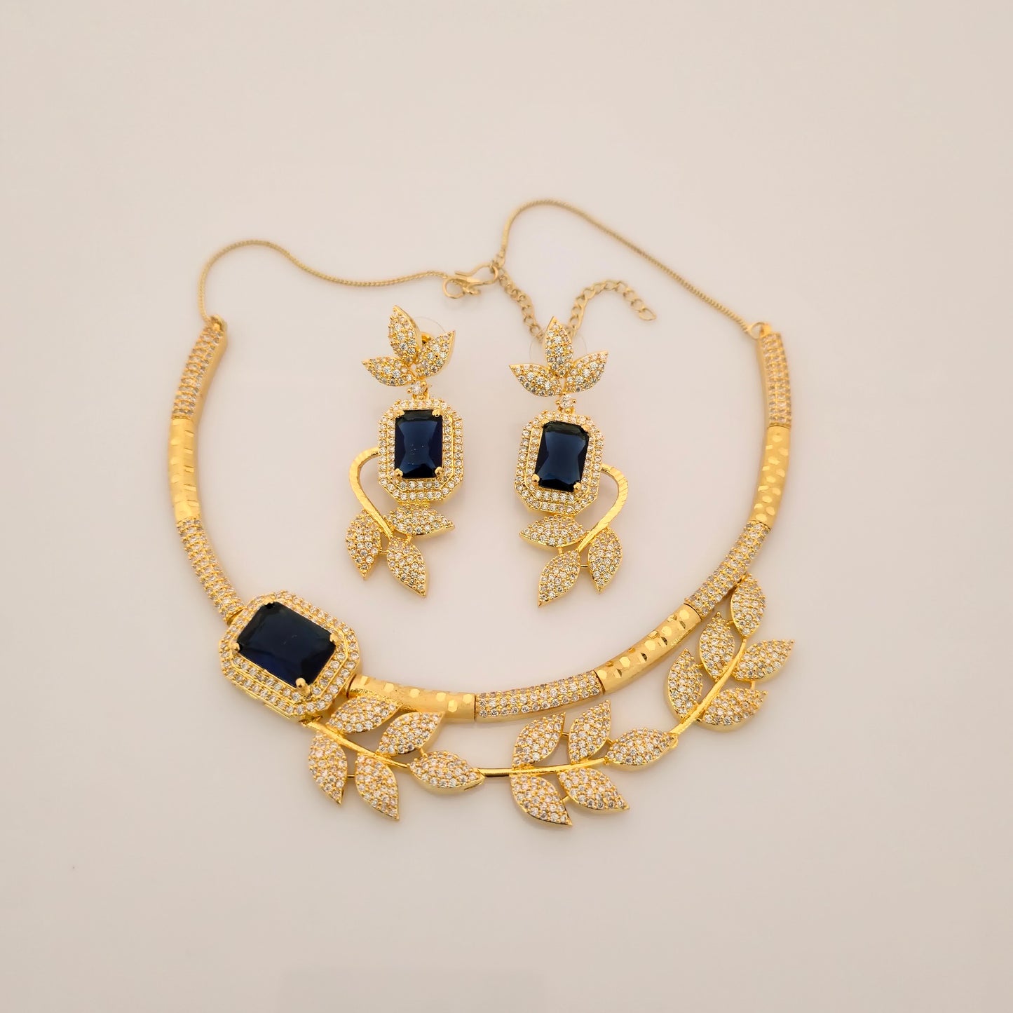 1.5 Gram Gold (Forming) Gold Tone Pink Stone AD/Zirconia Leaf Design Necklace Set | Elegant Designer Necklace with Earrings for Women
