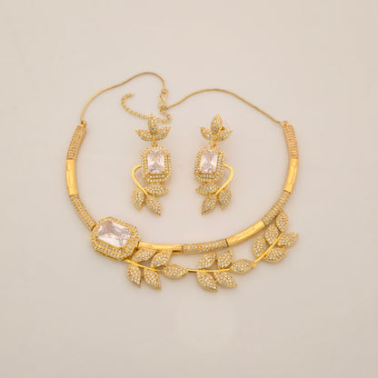 1.5 Gram Gold (Forming) Gold Tone Pink Stone AD/Zirconia Leaf Design Necklace Set | Elegant Designer Necklace with Earrings for Women
