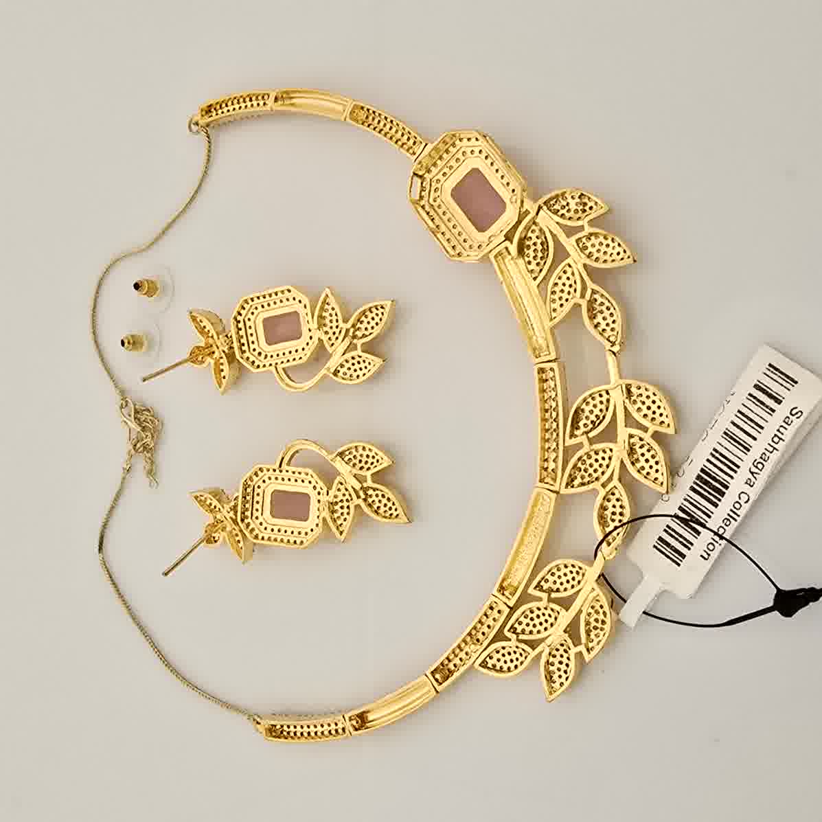 1.5 Gram Gold (Forming) Gold Tone Pink Stone AD/Zirconia Leaf Design Necklace Set | Elegant Designer Necklace with Earrings for Women