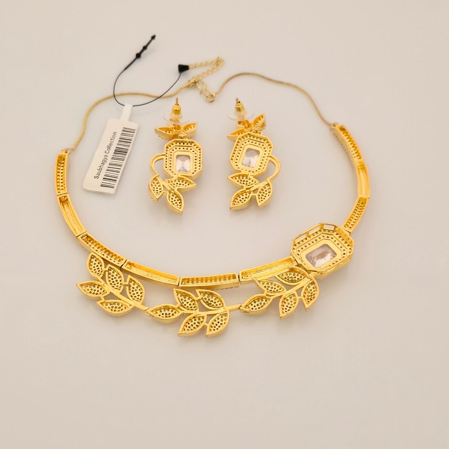 1.5 Gram Gold (Forming) Gold Tone Pink Stone AD/Zirconia Leaf Design Necklace Set | Elegant Designer Necklace with Earrings for Women