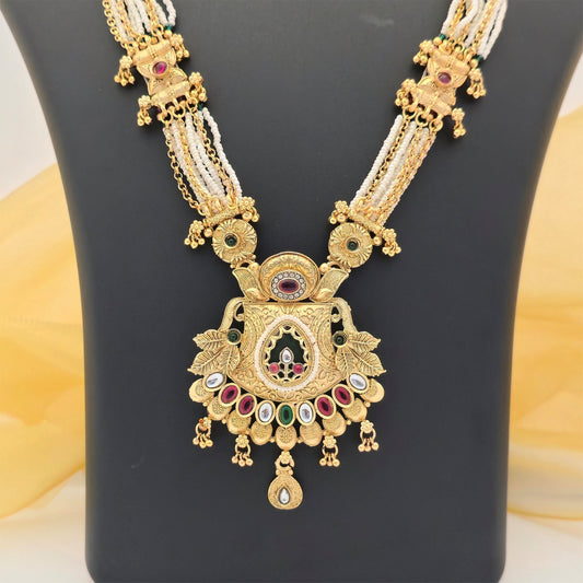 Gold Plated Rajwadi Polish Long Necklace Set with Multistrand White Beads, Designer Pendant and Matching Earrings for Women