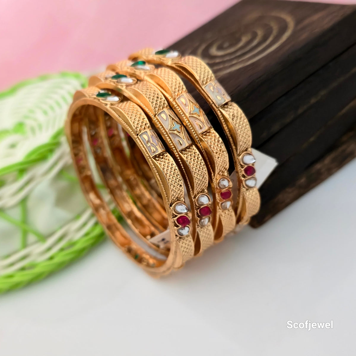 Rajwadi polish bangles with antique gold-tone finish, traditional designer bangles with red white and green stone accents, textured gold-tone ethnic bangles for women, Indian traditional bangles for wedding wear, multicolour stone Rajwadi bangles, antique finish imitation jewellery, Scofjewel traditional bangles