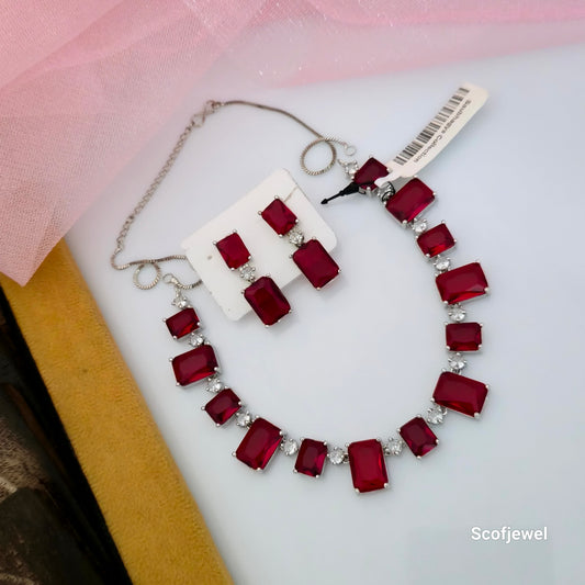 red rectangular stone necklace set with matching earrings, deep red designer necklace for women, silver tone necklace with red and white accent stones, geometric red imitation jewellery set, red party wear necklace with matching drop earrings, elegant red wedding jewellery for women, statement red necklace set for festive occasions, Scofjewel red stone jewellery