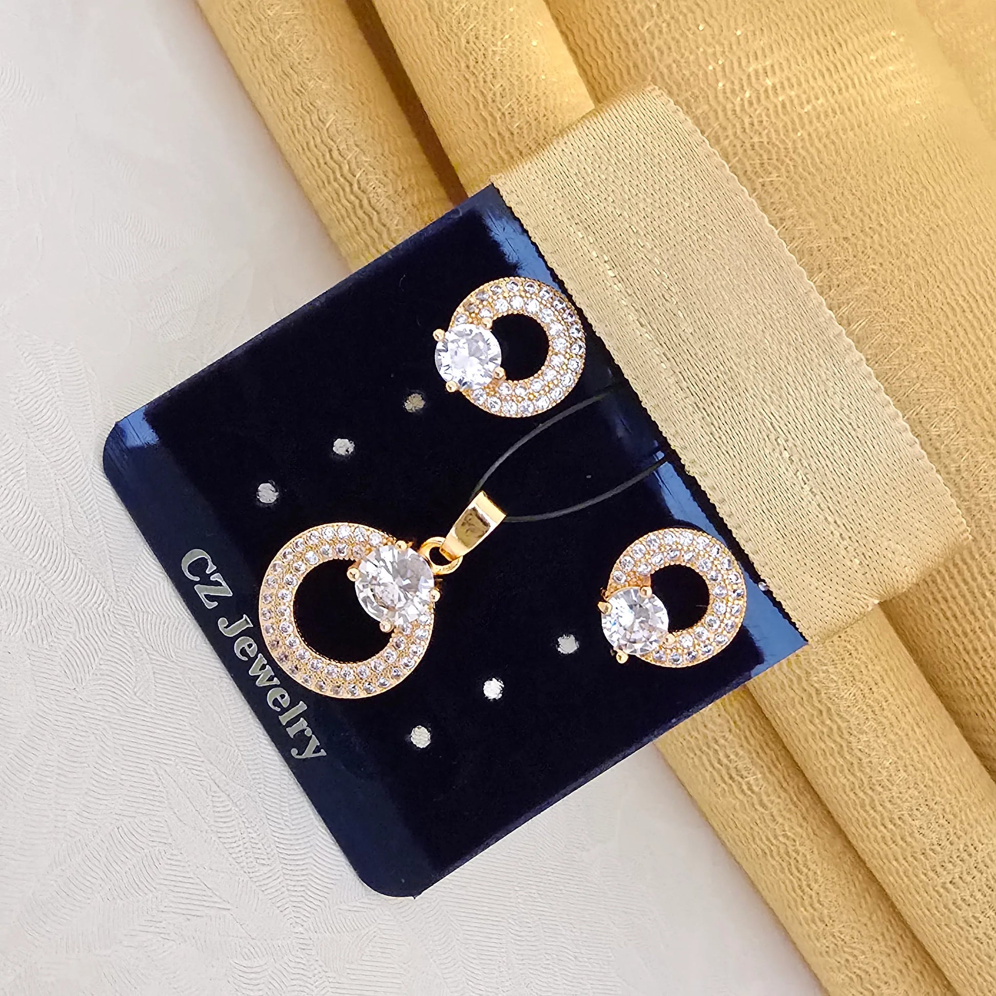 Rose_Gold_Circular_Pendant_Set_with_Solitaire_Crystal_Elegant_Party_Wear_Jewellery - Saubhagya Collection 