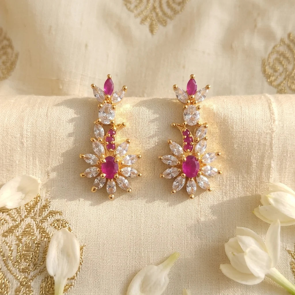 ruby pink earrings, floral crystal earrings, designer party wear earrings, gold finish earrings, womens statement earrings, festive jewellery, wedding earrings, elegant fashion earrings